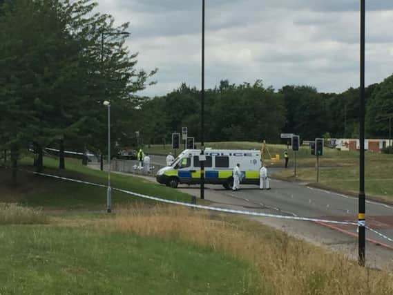 Police attend the scene of a fatal crash involving a school minibus and a bin lorry in the Castle Vale area of Birmingham.