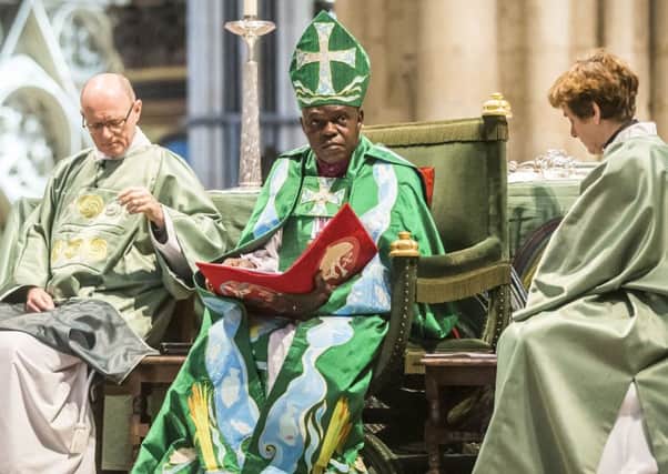 The Archbishop of York, Dr John Sentamu (centre) during the procession ahead of the Eucharist at York Minster in York