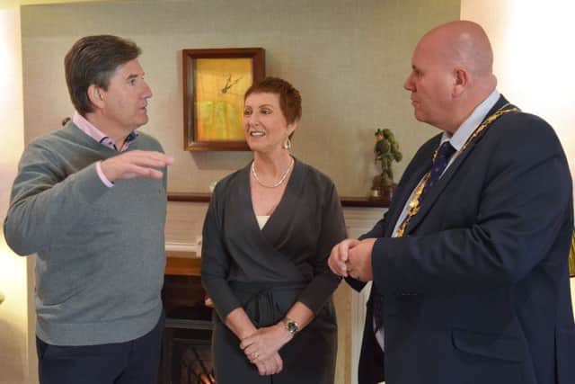 Daniel and his wife Majella in conversation with the Mayor of  Mid and East Antrim Borough, Councillor Paul Reid.  Photo by Aaron McCracken