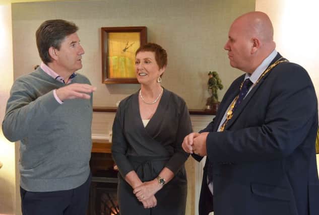 Daniel and his wife Majella in conversation with the Mayor of  Mid and East Antrim Borough, Councillor Paul Reid.  Photo by Aaron McCracken