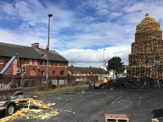 Properties being boarded up close to the Ravenscroft Avenue bonfire in east Belfast, as huge bonfires will be lit in loyalist areas across Northern Ireland on Tuesday night to usher in the main date in the Protestant loyal order parading season - the 'Twelfth of July'.