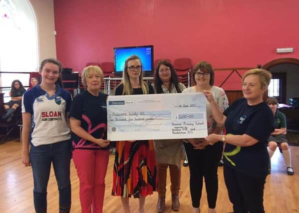 Randalstown YFC presenting a cheque for Â£2,050 to Alzheimer's NI