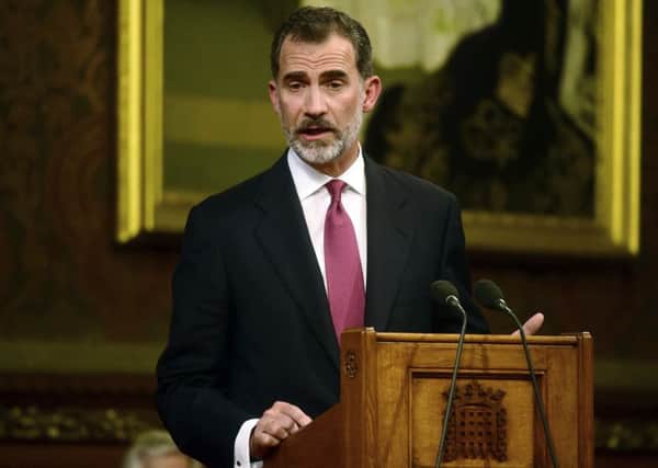 Spain's King Felipe delivers a speech at the Palace of Westminster in London, Wednesday, July 12, 2017. The King and Queen of Spain are on a three day State Visit to Britain. (Hannah McKay/Pool Photo via AP)
