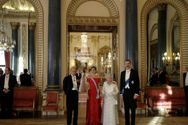 Queen Elizabeth II, the Duke of Edinburgh, King Felipe VI and Queen Letizia of Spain pose for a formal photograph before a State Banquet at Buckingham Palace, London, during the King's State Visit to the UK. Photo: Matt Dunham/PA Wire