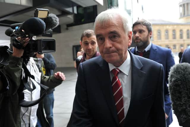 Shadow Chancellor John McDonnell (centre) arrives at BBC Broadcasting House in London for an interview in June. In an earlier BBC interview, in May, he said there was a lot to learn from Marx's Das Kapital. Photo: Ben Stevens/PA Wire