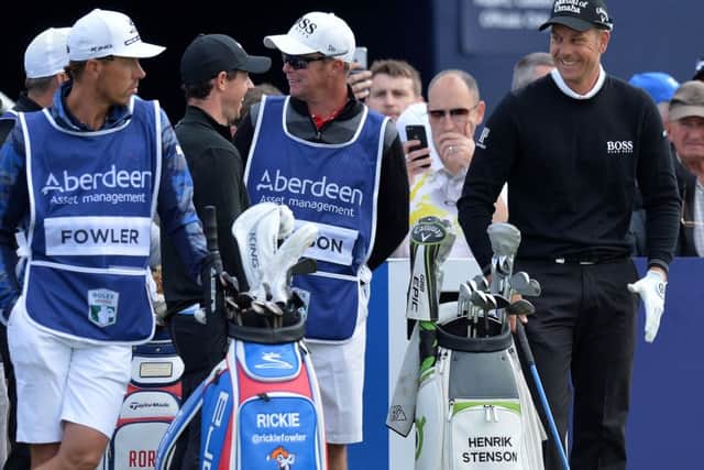 Sweden's Henrick Stenson (right) shares a joke with Northern Ireland's Rory McIlroy at the 1st hole during day one of the 2017 Aberdeen Asset Management Scottish Open at Dundonald Links