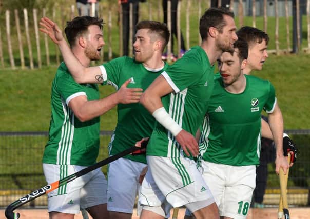 Ireland's Shane O'Donoghue celebrates scoring with teammates