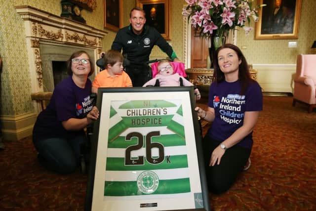 Celtic FC Manager Brendan Rodgers donates a shirt to the Northern Ireland Children's Hospice. 

Mr Rodgers is pictured with Luke and  Morag Mullan with 
Michelle and Aimee Neill.

 Photo by Kelvin Boyes / Press Eye.
