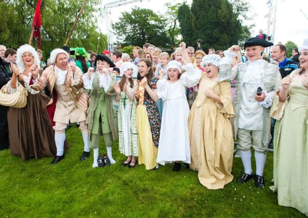 Period dress actors brought a new dimension to the 13th at Scarva this year as part of the new cultural field enterprise.