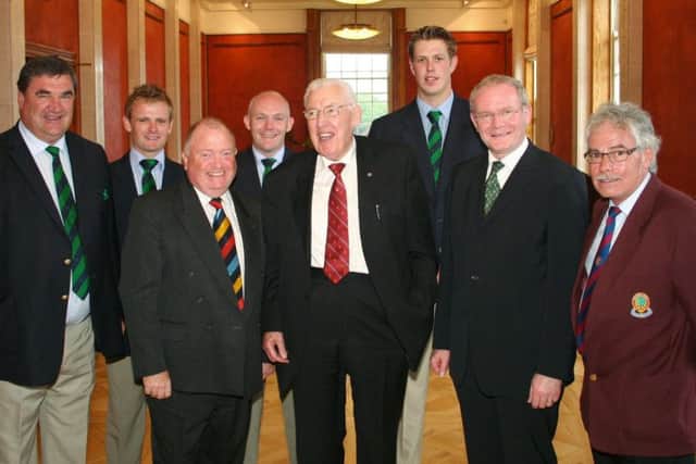 The late Martin McGuinness and Ian Paisley with Irish cricket officials and current captain William Porterfield and fast bowler Boyd Rankin