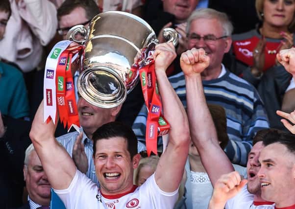 Sean Cavanagh lifting the Anglo-Celt Cup during the Ulster GAA Football Senior Championship Final match between Tyrone and Down at St Tiernach's Park