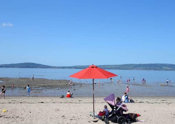 People enjoy the sunny and warm weather just outside Holywood in Co Down