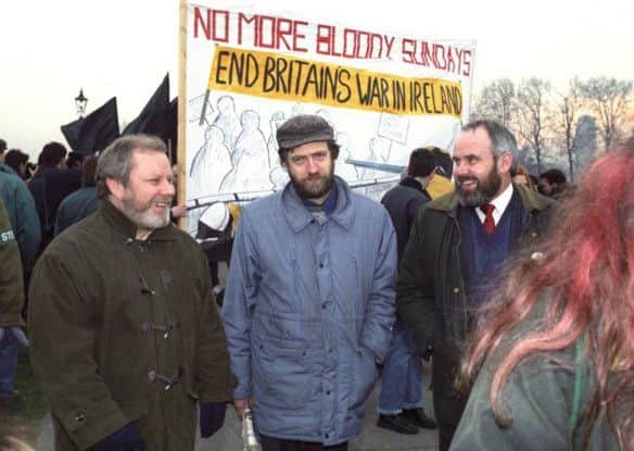 Gerry MacLochlainn (left) and Francie Molloy (right) pictured with Jeremy Corbyn at a Bloody Sunday march in London during the 1980s