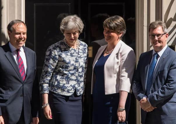 Theresa May at Downing Street with Nigel Dodds, Arlene Foster and Sir Jeffrey Donaldson of the DUP