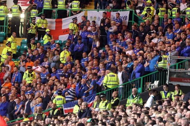 Linfield fans inside Celtic Park  under tight security
