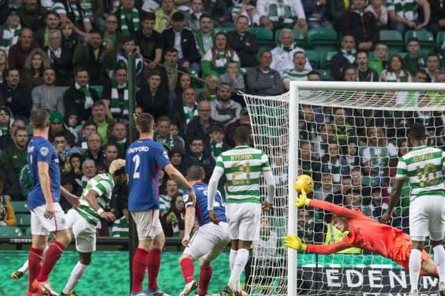 Scott Sinclair of Celtic score the 3rd goal during the Champions League Second qualifying round match between Celtic and Linfield at Celtic Park