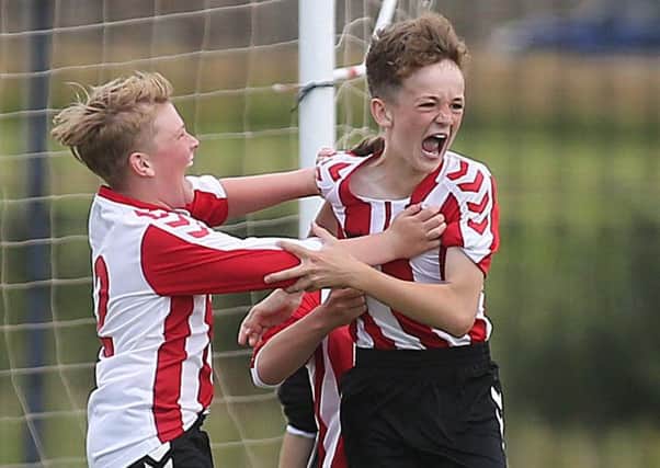 Derry Colts captain Zack Dougherty celebrates his decisive goal for the under 12s against Tristar during Thursday's Foyle Cup fixtures. Pic by PressEye Ltd.