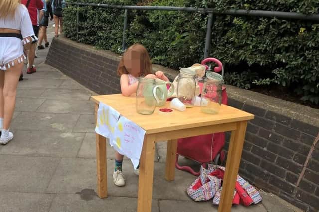 Andre Spicer's five-year-old daughter running a lemonade stand before it was shut down by Tower Hamlets council