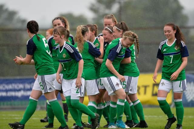 Northern Ireland's Emily Wilson celebrates after scoring to make it 2-0.
