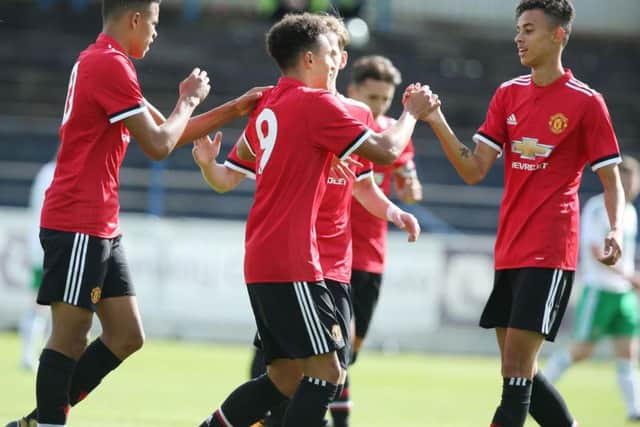 Manchester United's Nishan Burkart celebrates scoring against Northern Ireland during Saturday's SupercupNI Challenge Cup match at the Coleraine Showgrounds.