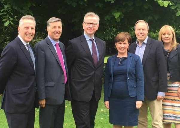 Michael Gove (third left) with DUP representatives Ian Paisley MP, Paul Girvan MP,  Diane Dodds MEP, Nigel Dodds MP and Michelle McIlveen MLA