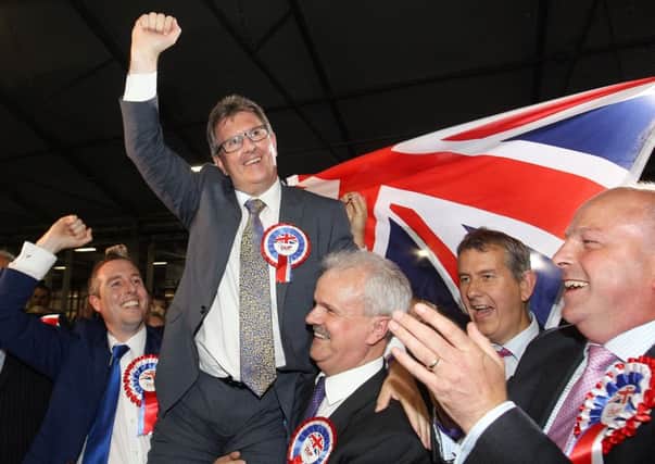 Sir Jeffrey Donaldson is held aloft by supporters after being easily returned as DUP MP for Lagan Valley, after which he as chief whip at Westminster helped secure a deal with the Conservative Party. 

Picture by Jonathan Porter/PressEye.com