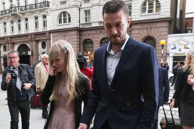 Charlie Gard's parents Chris Gard and Connie Yates arrive at the Royal Courts of Justice in London ahead of the latest High Court hearing in a five-month legal battle over whether the terminally-ill baby should be treated by a specialist in America
