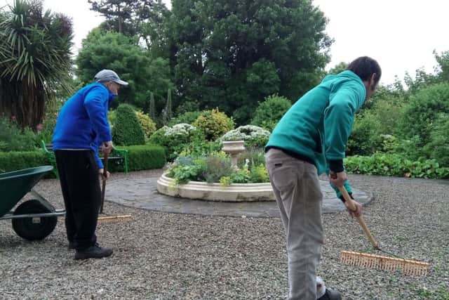 Community service work being carried out at Downshire Hospitals Victoria Garden project in Downpatrick