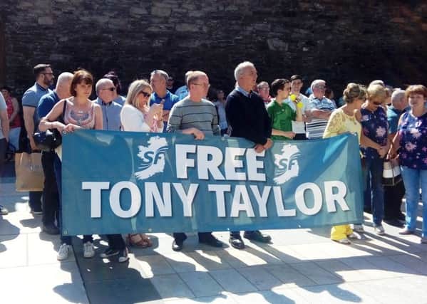 Supporters of Tony Taylor at Sunday's rally calling for his release