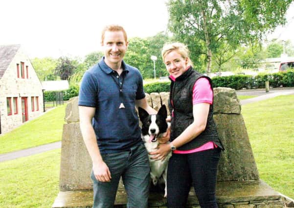 Brian White and Aoife Smith with their 7,200gns top price Skipton dog, Ben