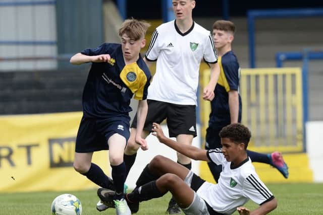 Co Londonderry's Daylan Farren and First Choice Soccers Jackson Dickson