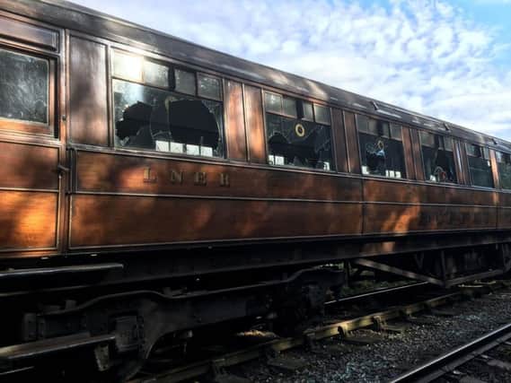 Handout photo issued by North Yorkshire Moors Railway of one of a set of antique train carriages that have been vandalised by thugs.