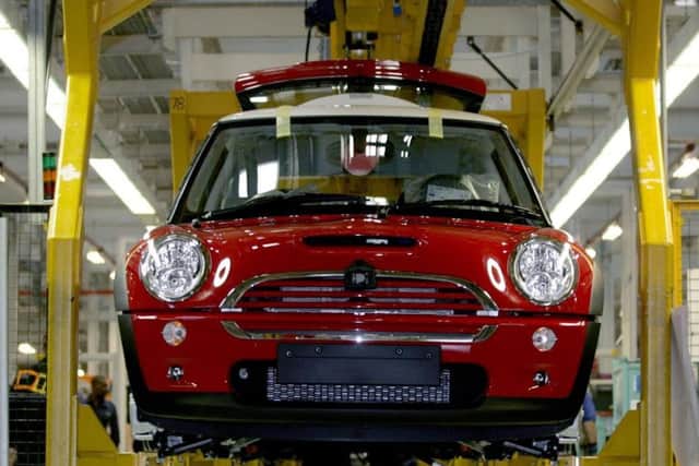 BMW announced on Tuesday that they will build an all-electric version of the Mini in the UK