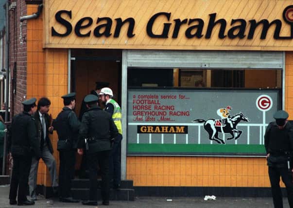The scene in the aftermath of the 1992 Ormeau Road shooting, when the UDA entered and shot at around 15 customers and staff, killing five