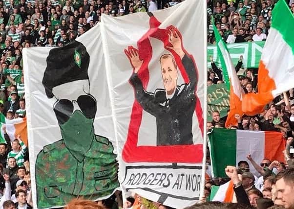 Banners displayed by Celtic fans at the club's match with Linfield on July 19.