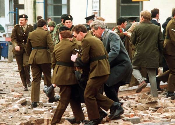 The scene of the Enniskillen bomb seconds after the blast. Pacemaker