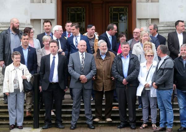 Relatives of those killed by a loyalist gang in the Gleanne area of Armagh in the 1970's pictured at the High Court in Belfast where they won a ruling in their favour about the investigation into the killings. Picture by Jonathan Porter/PressEye.com