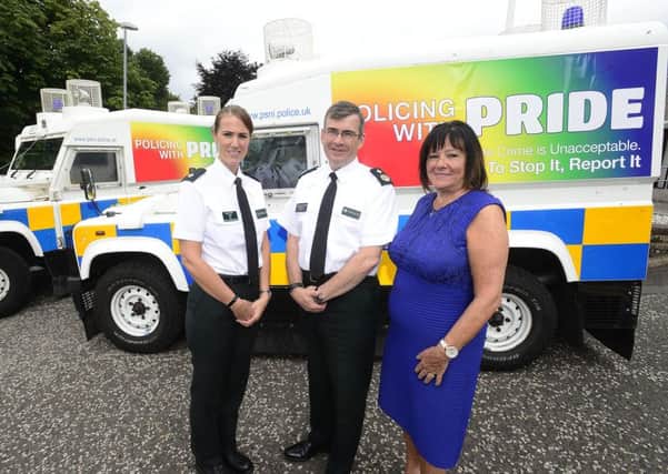 Pictured at the launch of the Policing with Pride vehicles are (L to R)  Superintendent Emma Bond, PSNI Hate Crime Lead, Deputy Chief Constable Drew Harris and Anne Connolly, Chair of Northern Ireland Policing Board.