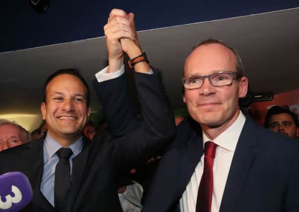Leo Varadakar (left) and Simon Coveney were accused of sending out mixed messages on Brexit by the DUP's Nigel Dodds