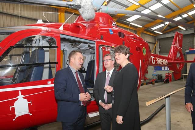 DUP leader Arlene Foster and party colleague Sir Jeffrey Donaldson MP pictured at the launch event with Chief Executive of the Air Ambulance, Patrick Minne. Pic by Jonathan Porter, PressEye