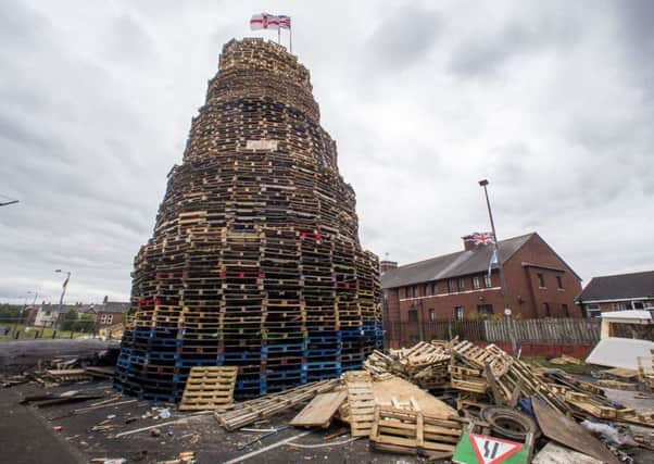 A loyalist bonfire at Bloomfield Walkway in Belfast. Council officials with the best of intentions tried last month to reduce the scale of some July 11 bonfires: Photo: PA Wire