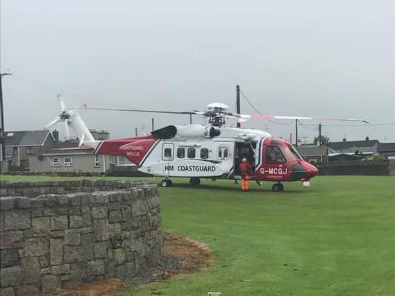 A Coastguard helicopter at Annalong Marine Park, close to the Mourne Mountains. Photo: Annalong Harbour Watch