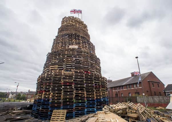A loyalist bonfire at Bloomfield Walkway in Belfast. Police in Northern Ireland have warned their resources could be stretched amid growing fears of tension around the burning of Eleventh night bonfires. PRESS ASSOCIATION Photo. Picture date: Monday July 10, 2017. See PA story ULSTER Twelfth. Photo credit should read: PA Wire