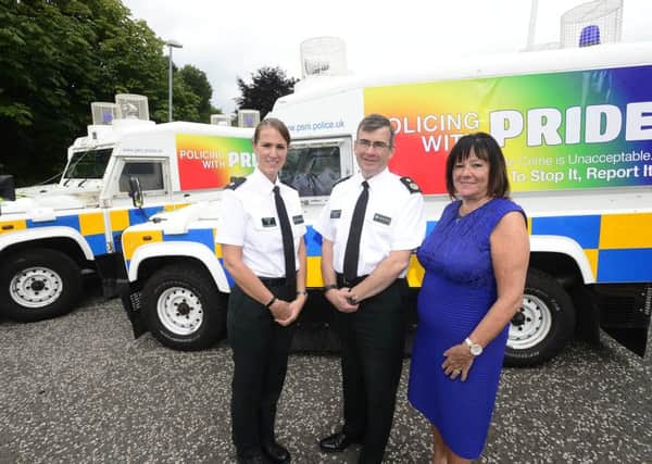 Pictured at the launch of the Policing with Pride vehicles are (L to R)  Superintendent Emma Bond, PSNI Hate Crime Lead, Deputy Chief Constable Drew Harris and Anne Connolly, Chair of Northern Ireland Policing Board