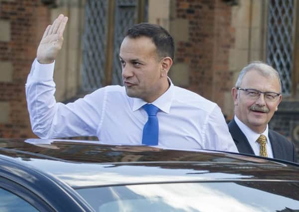 Irish Taoiseach Leo Varadkar (left) is greeted by Queen's University President and Vice-Chancellor James McElnay as he arrives at the university in Belfast to make a speech on his first visit to Northern Ireland.