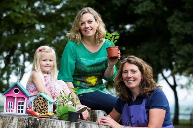 Event Organiser Joanne McErlain, Babble (centre) joins 4 year old Teegan Coates, Lisburn, and Kitchen Gardener Jilly Dougan to launch the 3rd Speciality Food Fair Moira, which will return to the picturesque parkland setting of Moira Demesne on Saturday 12th August from 10am - 6pm.