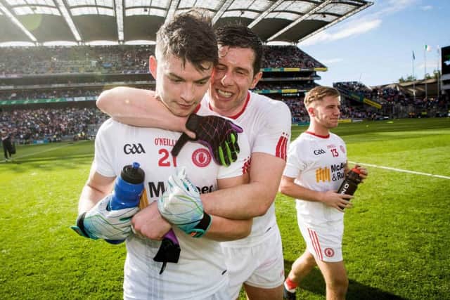 Tyrone's Sean Cavanagh celebrates with Richael Donnelly