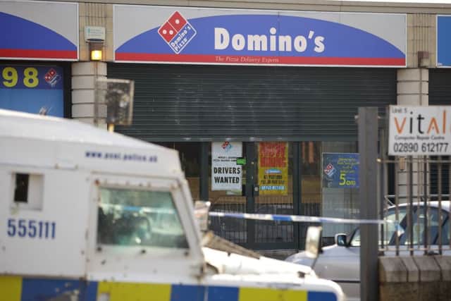 The scene at Domino's Pizza shop on Kennedy Way, Belfast