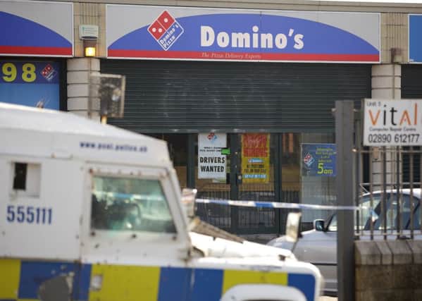 The scene at Domino's Pizza shop on Kennedy Way, Belfast