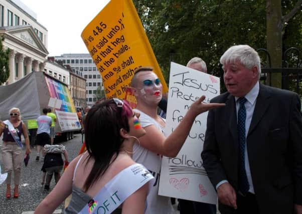 Pro gay protestors confront anti gay protestors at Belfast Pride in 2011 in the city centre